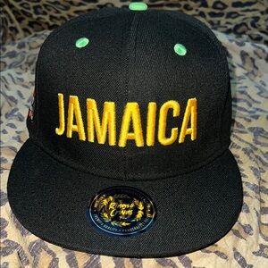 NWT Jamaica Black and Gold Cap size 7 1/4